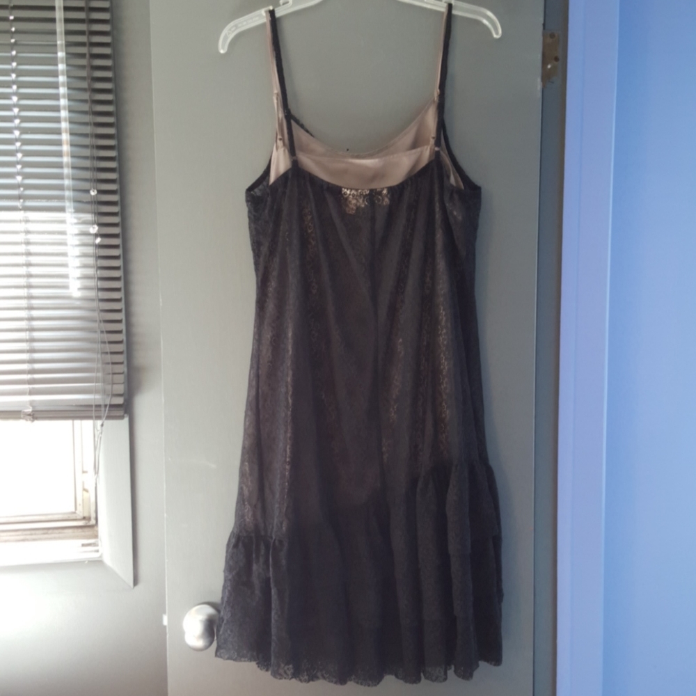 Sttetchy black lace dress with attached slip